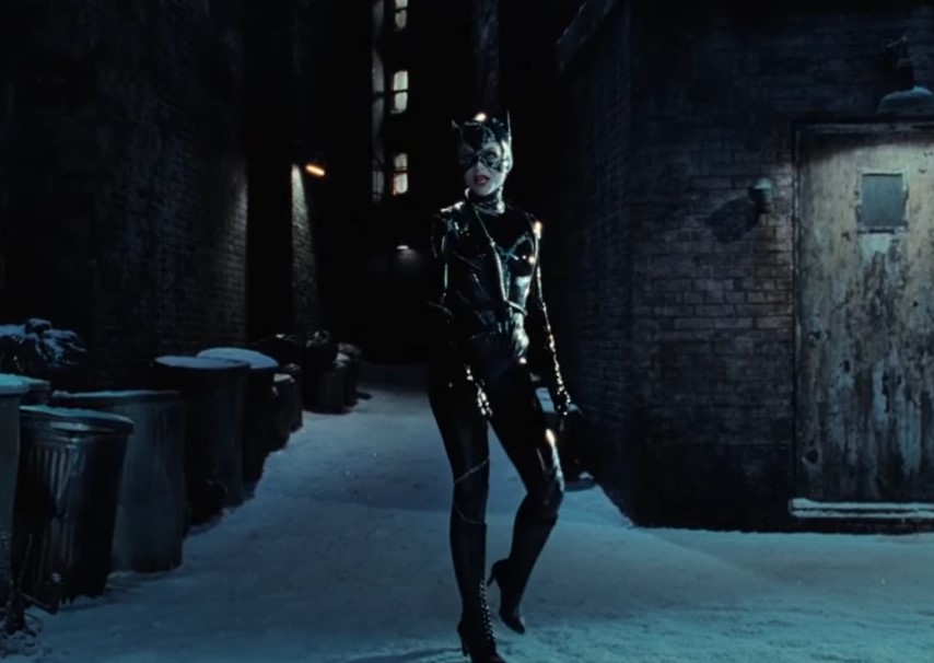 Cat woman walking on the street