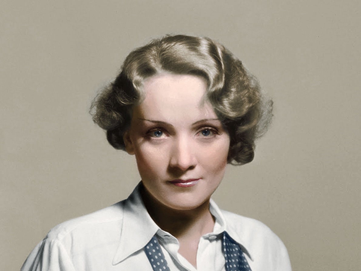 Portrait of Marlene Dietrich looking at camera.