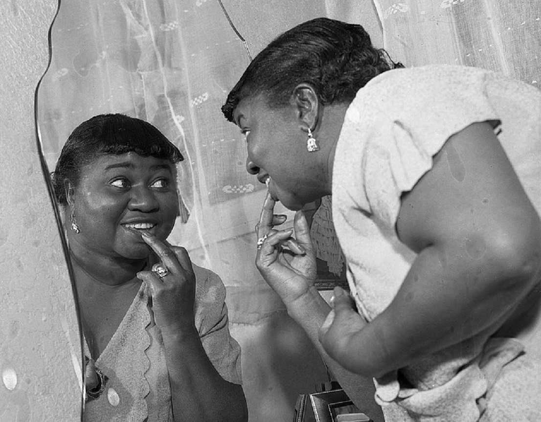 Actress Hattie McDaniel at her dressing table - 1940