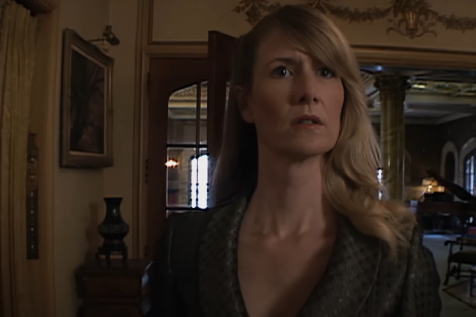 Laura Dern in Inland Empire (2006) standing at the door