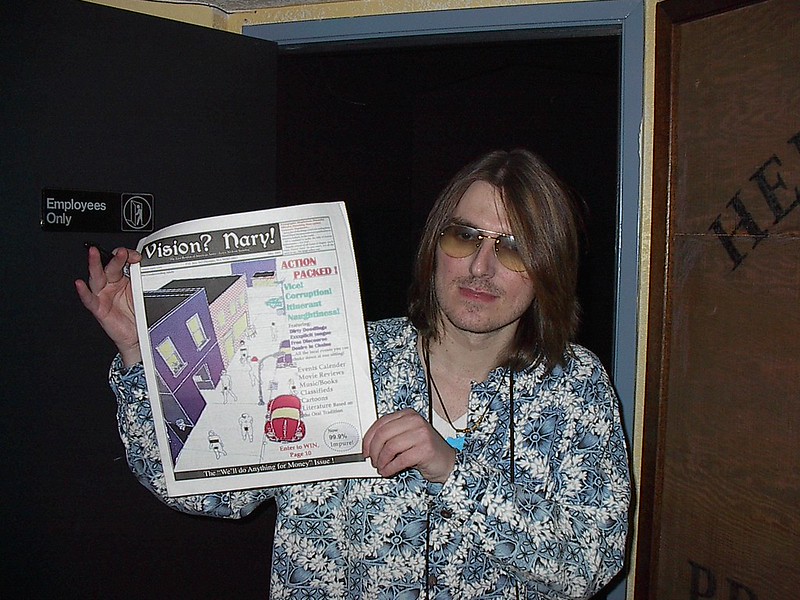 Portrait Photo of the comedian Mitch Hedberg in a floral shirt