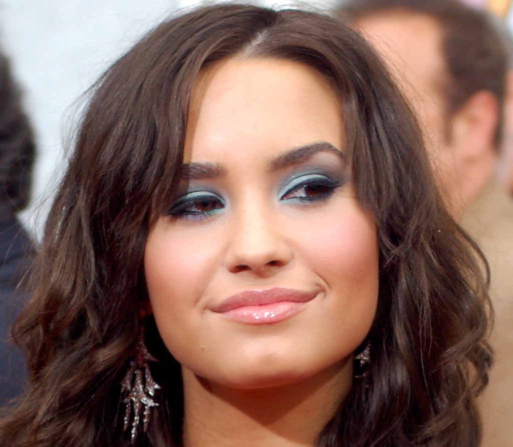 Demi Lovato looking at side -  2009