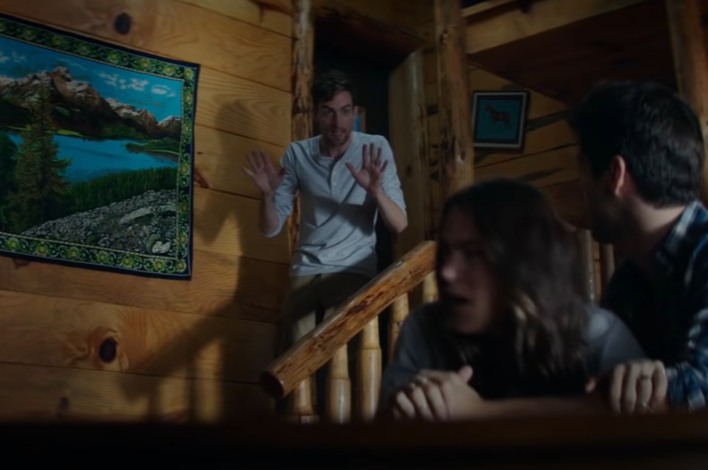 Screenshot of scared people in cabin from - Cabin Fever (2016)