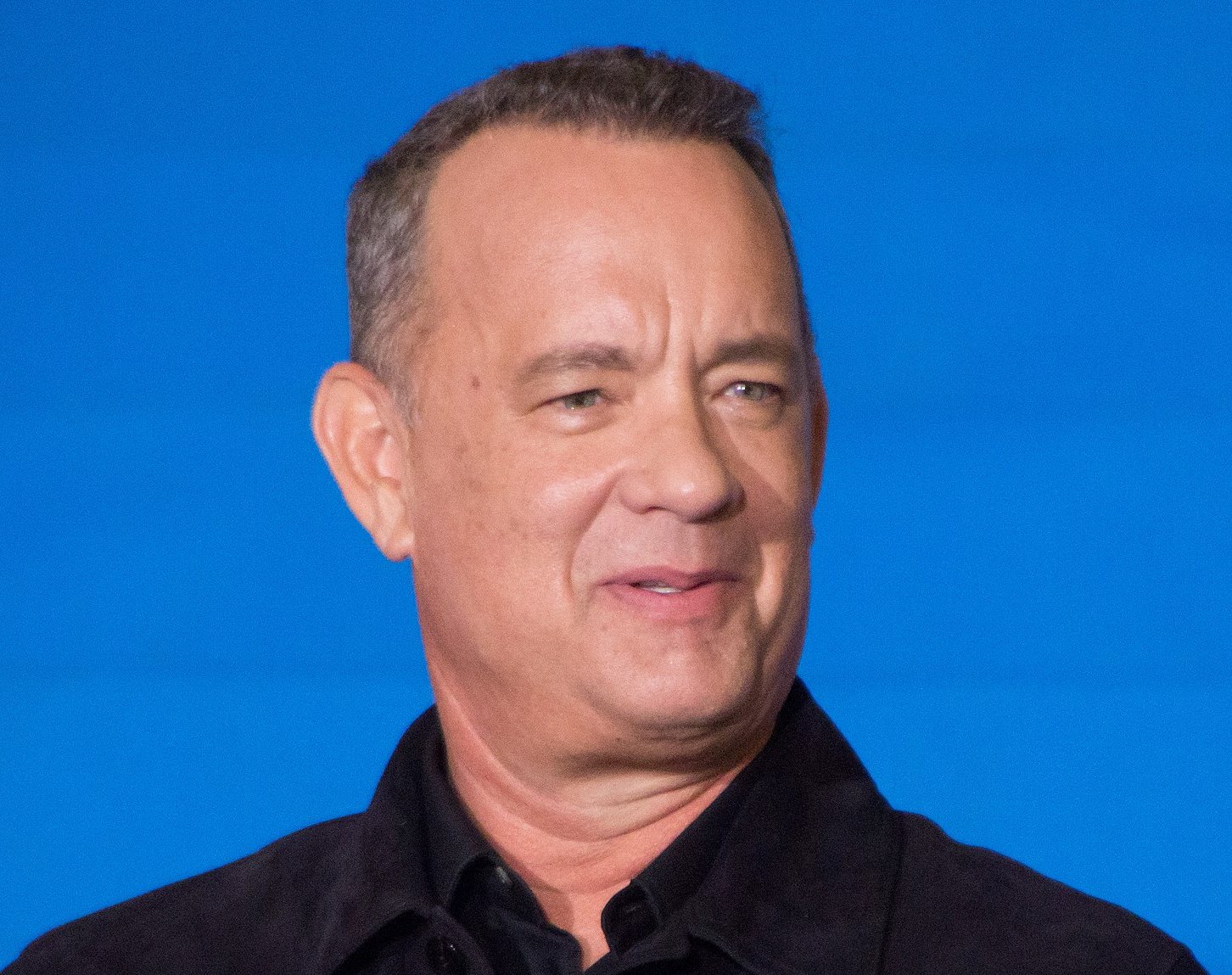 Portrait Photo of the Actor Tom Hanks in a black shirt