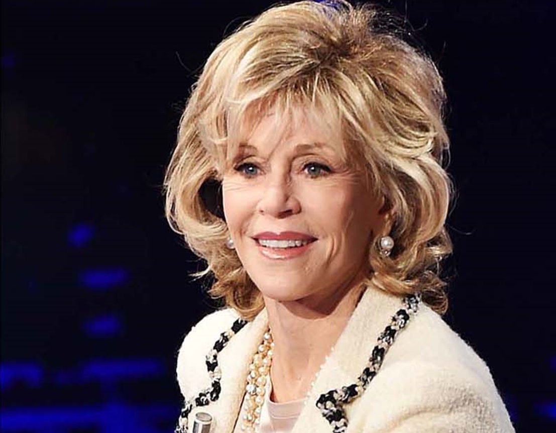 Jane Fonda looking at side and smiling.