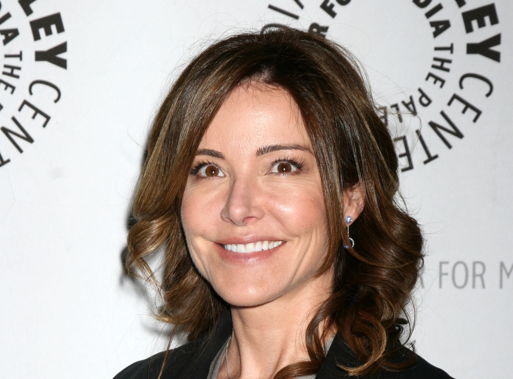 Christa Miller arrives at the