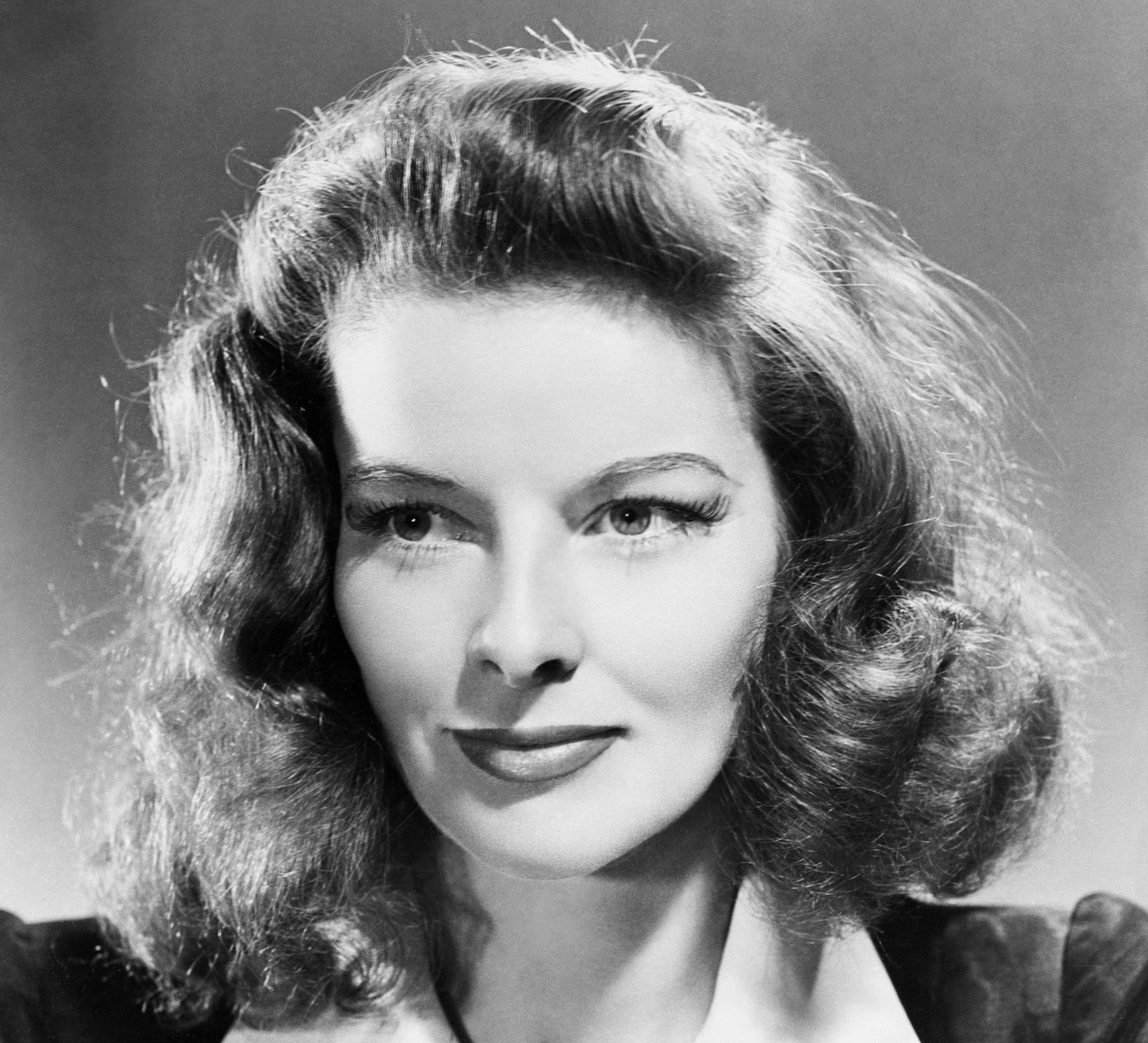 Grayscale Studio publicity photograph of Katharine Hepburn.