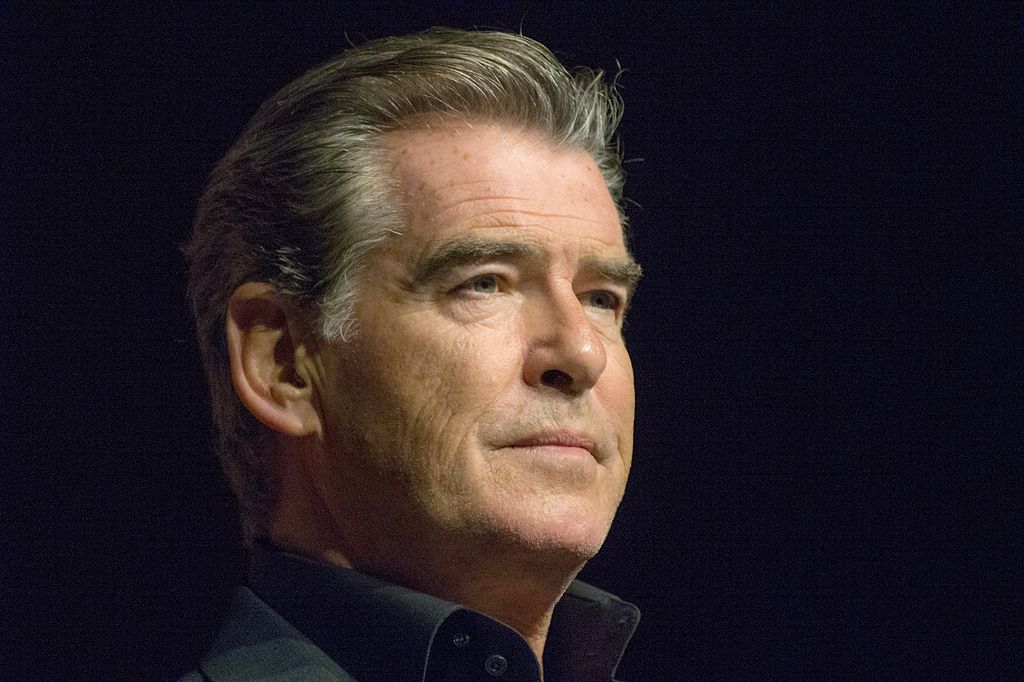 Portrait Photo of the actor Pierce Brosnan in a dark shirt