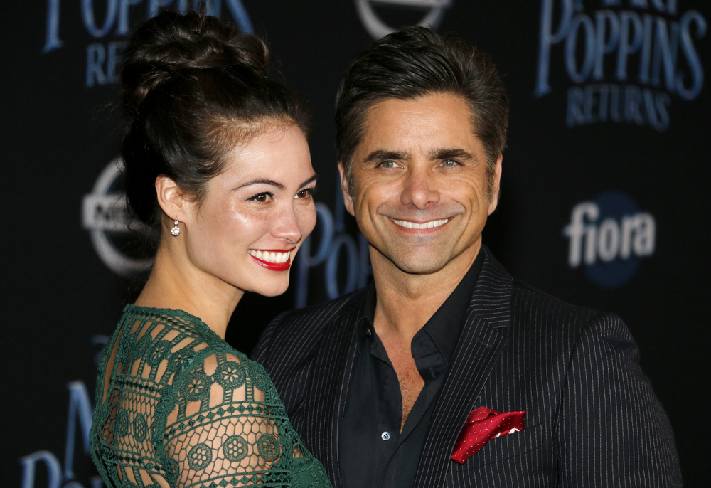 Caitlin Mchugh and John Stamos at the World premiere of Disney's 'Mary Poppins Returns'
