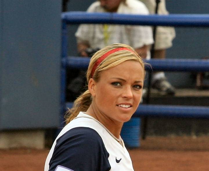 Portrait Photo of Jennie Finch in a white and blue shirt looking sideways