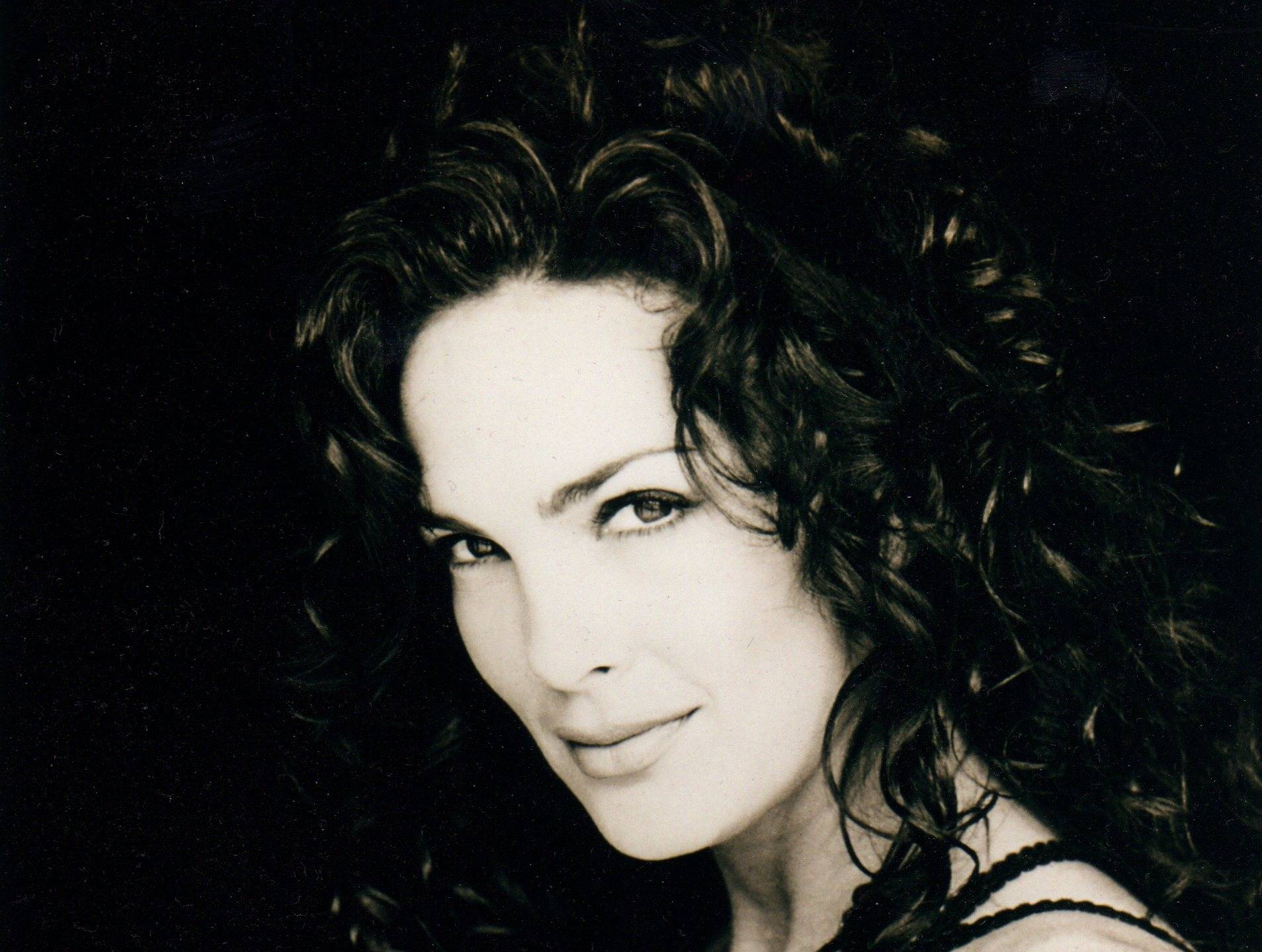 Grayscale Portrait Photo of American actress and model Julie Strain