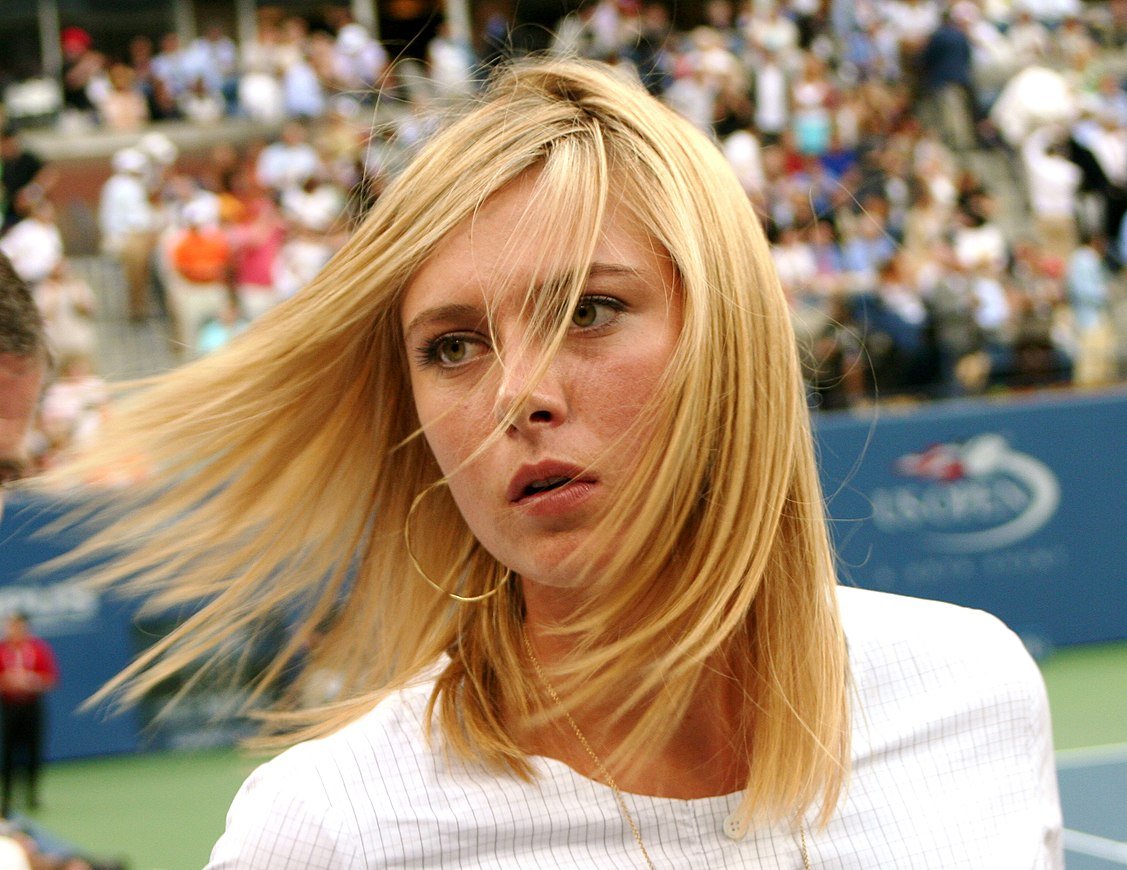 Portrait Photo of Maria Sharapova in a white dress at the 2007 US Open