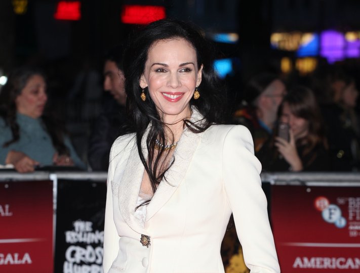 L'Wren Scott arriving the Premiere of 'Crossfire Hurricane'