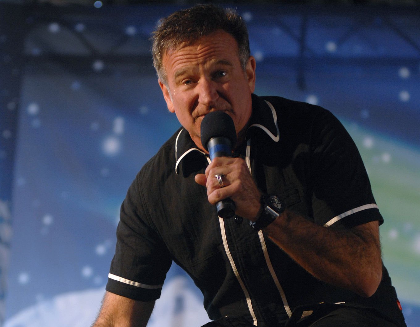 Robin Williams performs as part of a USO holiday show