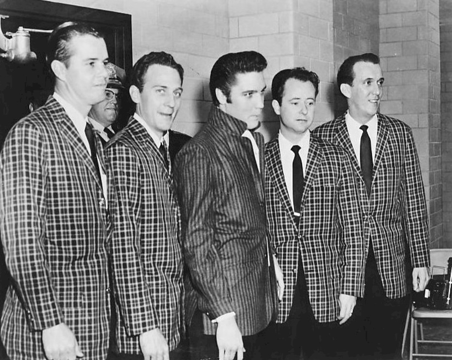 Photo of Elvis Presley with his backup group for many years, The Jordanaires.