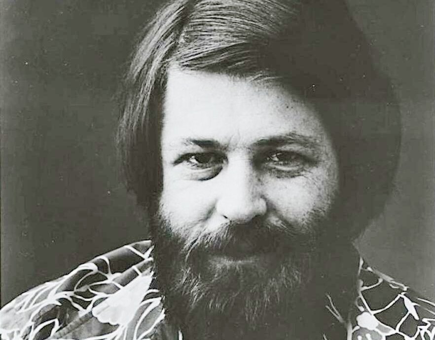 Grayscale Portrait Photo of Brian Wilson in 1977 smiling