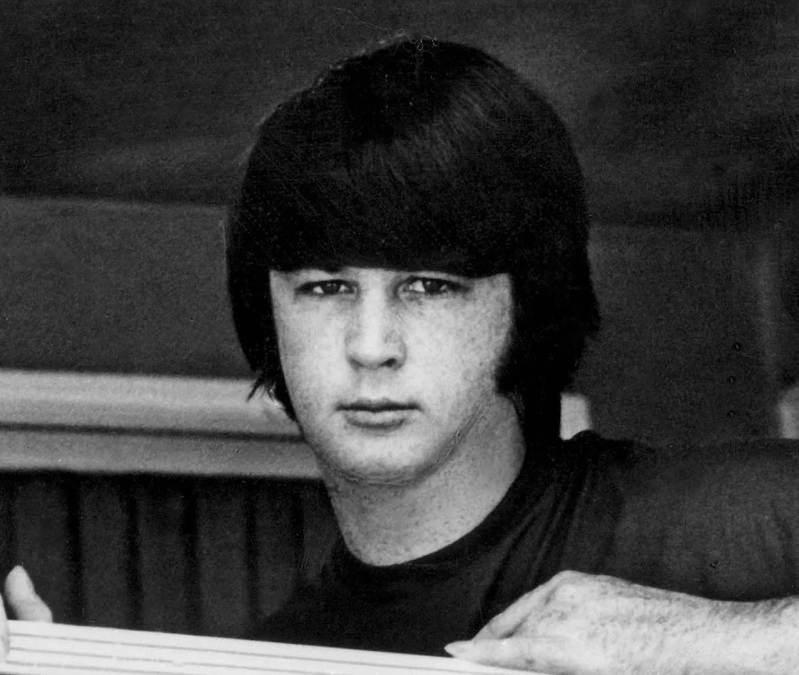 Grayscale Portrait Photo of Brian Wilson in a black shirt facing the camera