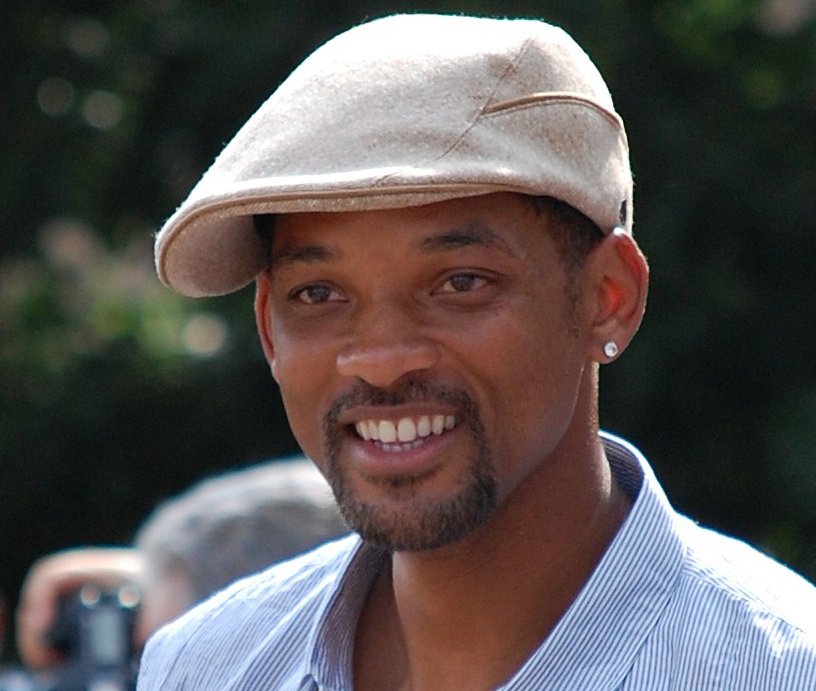 Portrait Photo of Will Smith with blue shirt and white hat