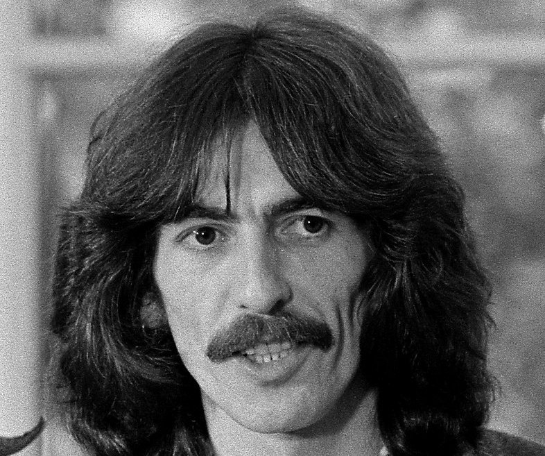 Grayscale Portrait Photo of George Harrison in the Oval Office