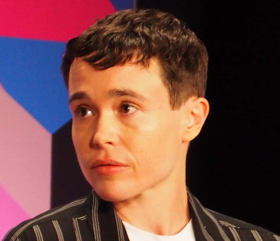 Elliot Page reading at the 2023 National Book Festival