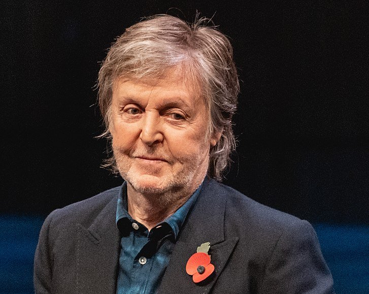 Portrait Photo of Paul McCartney in a dark outfit