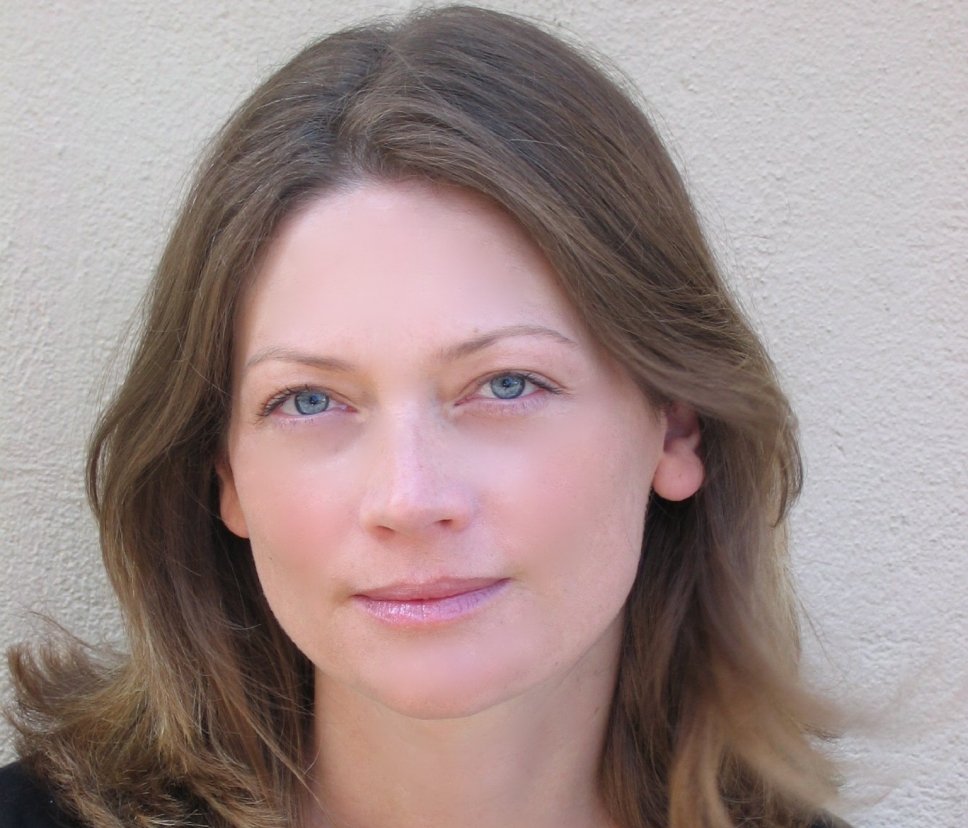 Portrait Photo of Actress Sophie Ward in a dark outfit