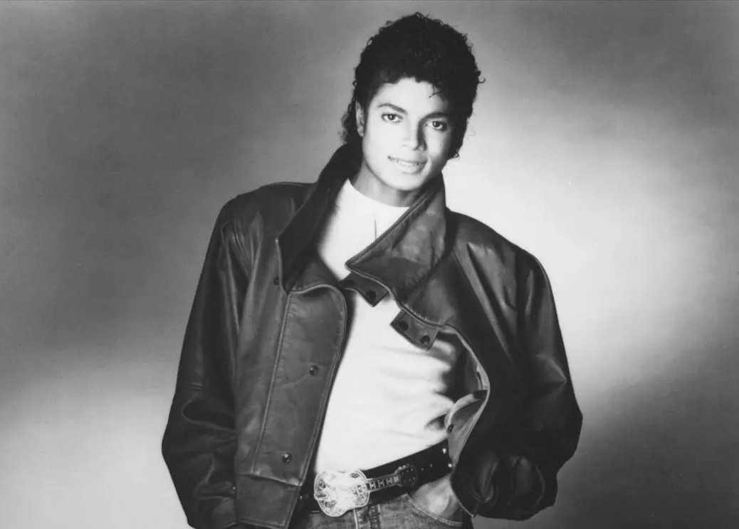 Grayscale Portrait Photo of Michael Jackson in a black jacket