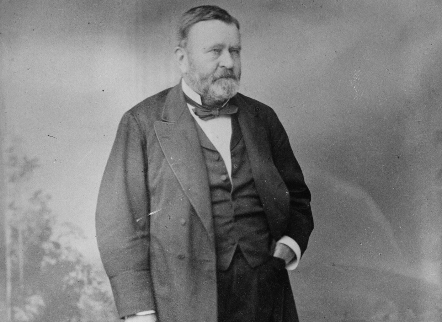 Grayscale Portrait Photo of Ulysses S. Grant in a dark suit