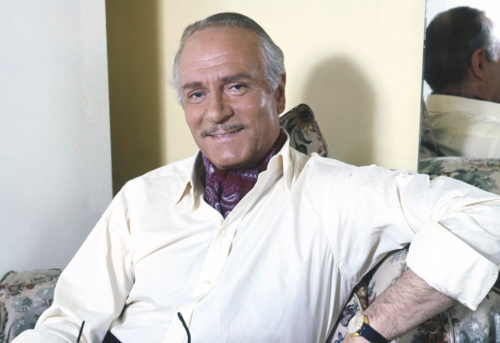 Sir Laurence Olivier posing