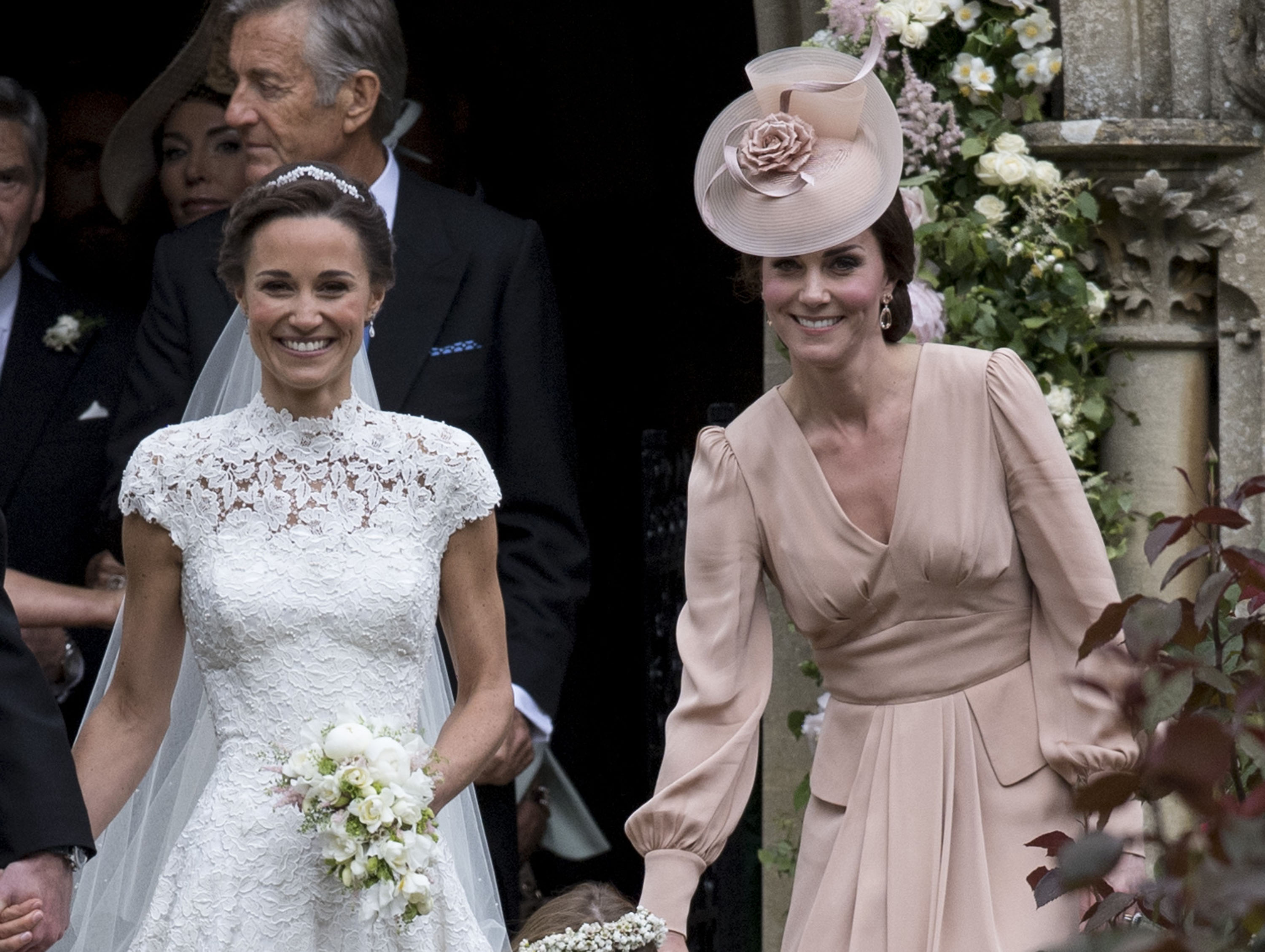 Pippa Middleton and Catherine, Duchess of Cambridge attend the wedding of Pippa Middleton and James Matthews - 2017