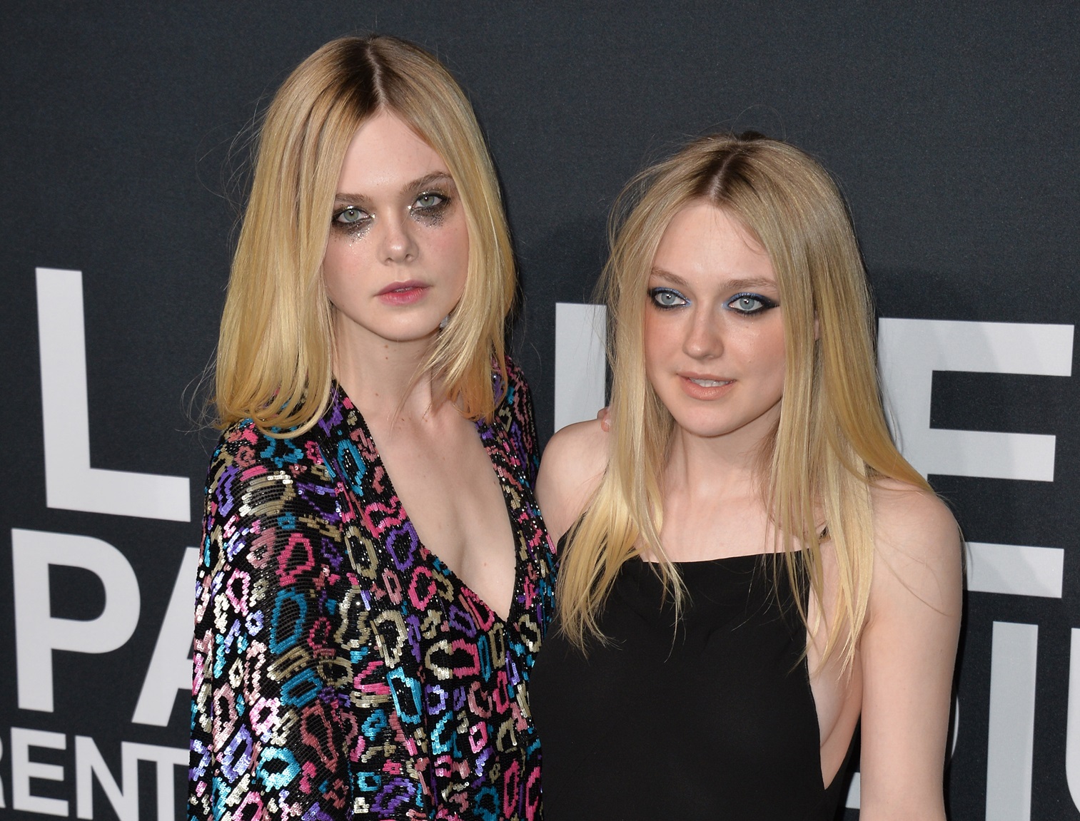 Actresses Elle Fanning & Dakota Fanning arriving at the Saint Laurent at the Palladium fashion show at the Hollywood Palladium. - 2016
