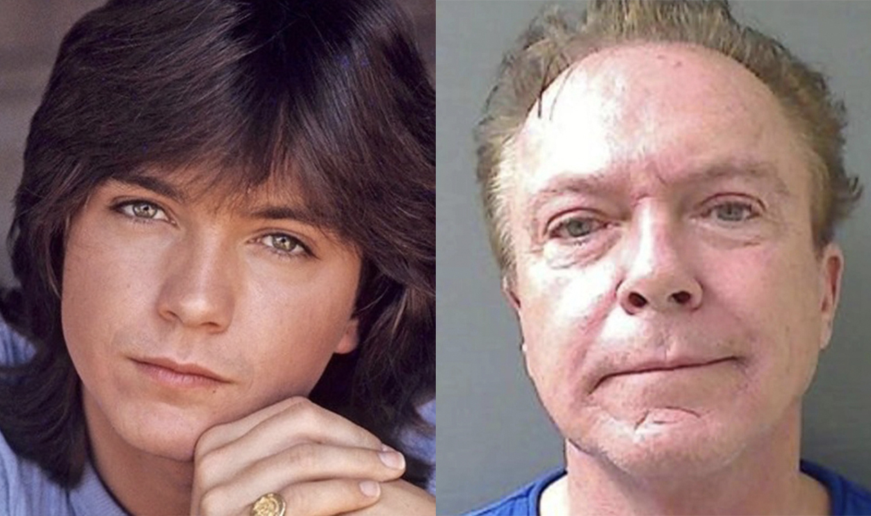 David Cassidy wearing black suit and white shirt is smiling and looking at side - 2004