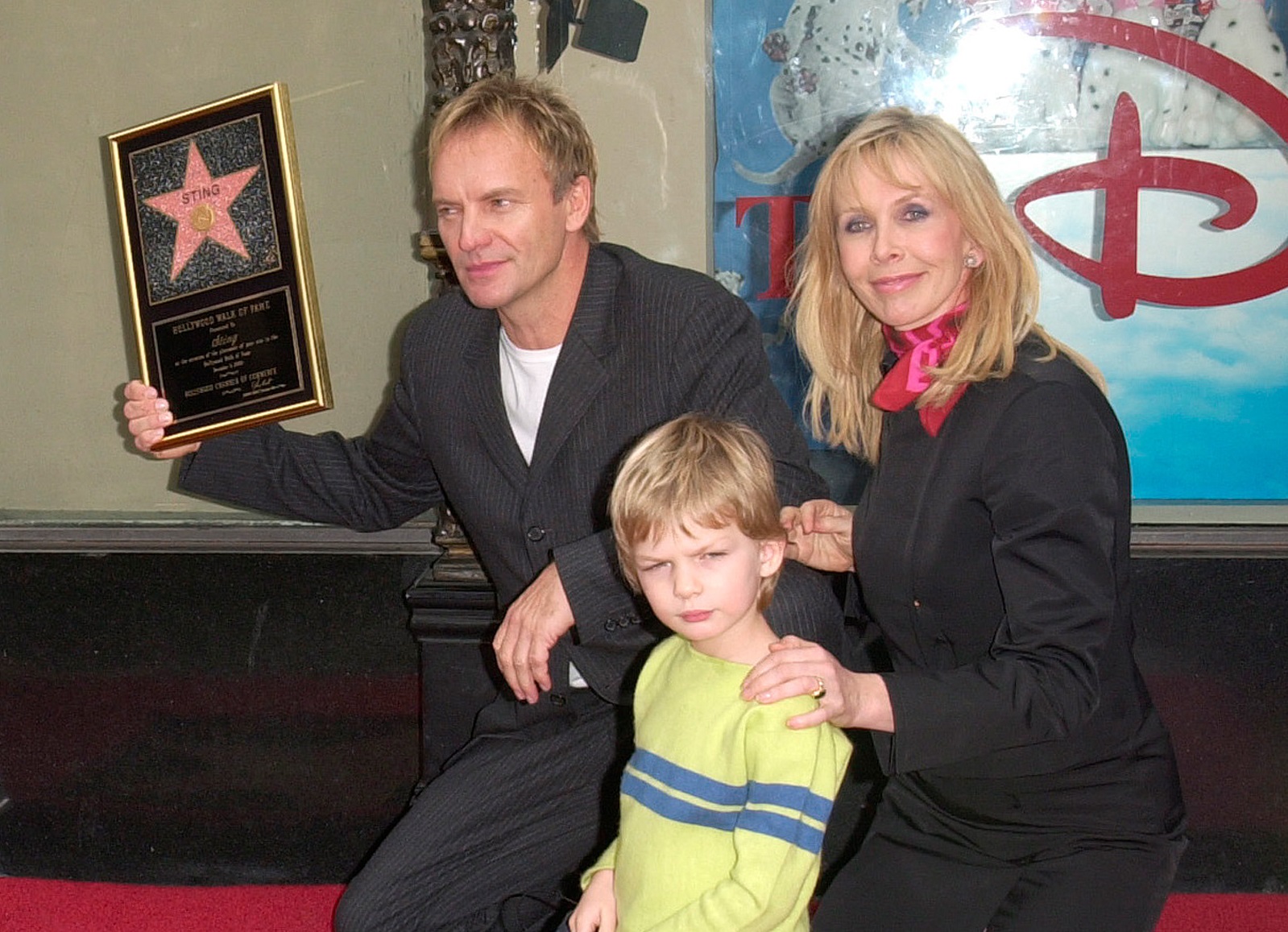 Pop star STING, with actress wife TRUDIE STYLER & son GIACOMO, on Hollywood Boulevard - 2000