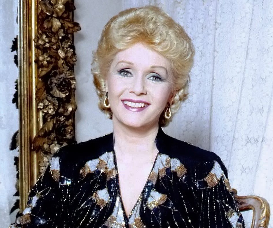 Portrait Photo of the Actress Debbie Reynolds wearing a black dress
