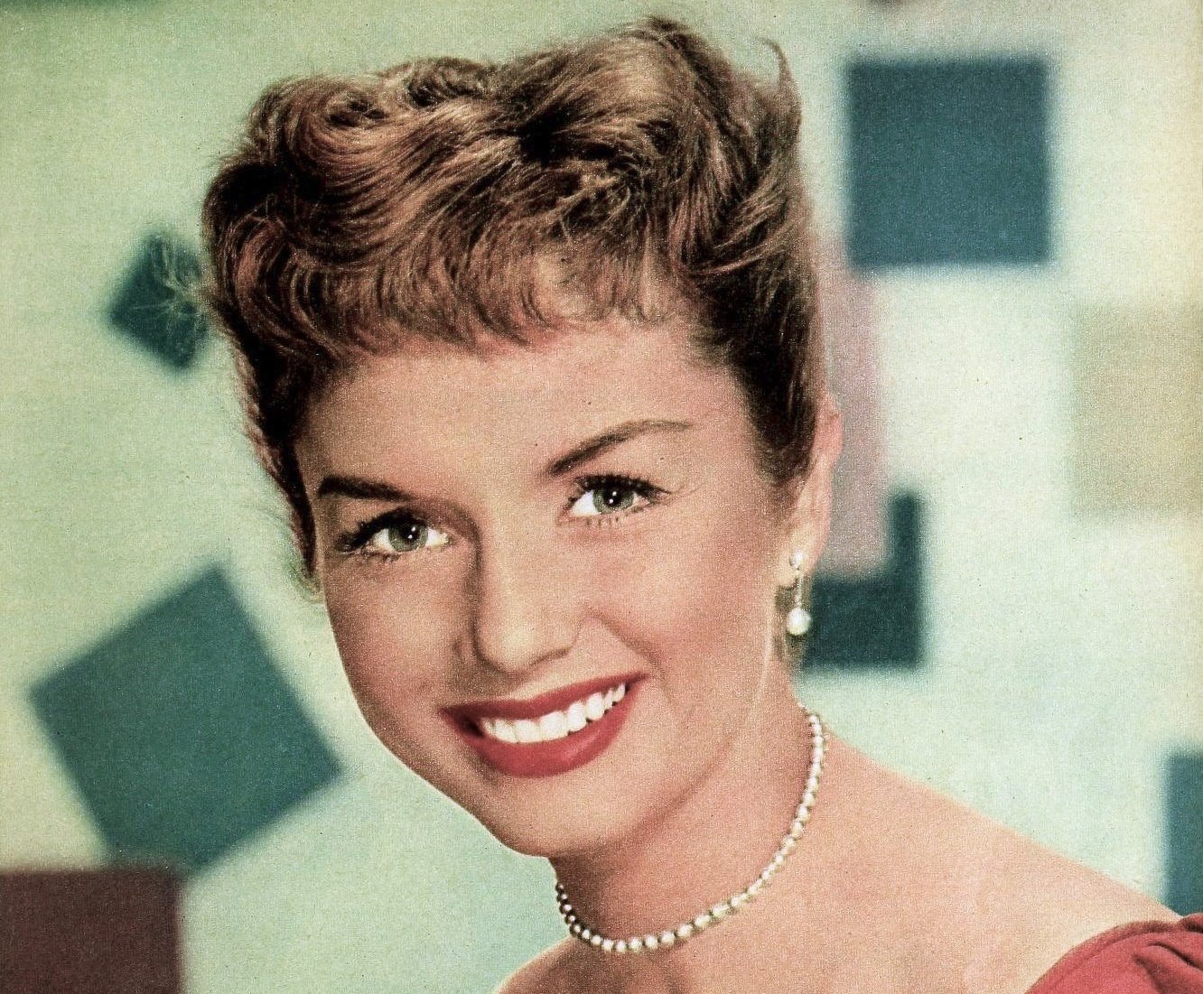 Portrait Photo of the Actress Debbie Reynolds in a red dress