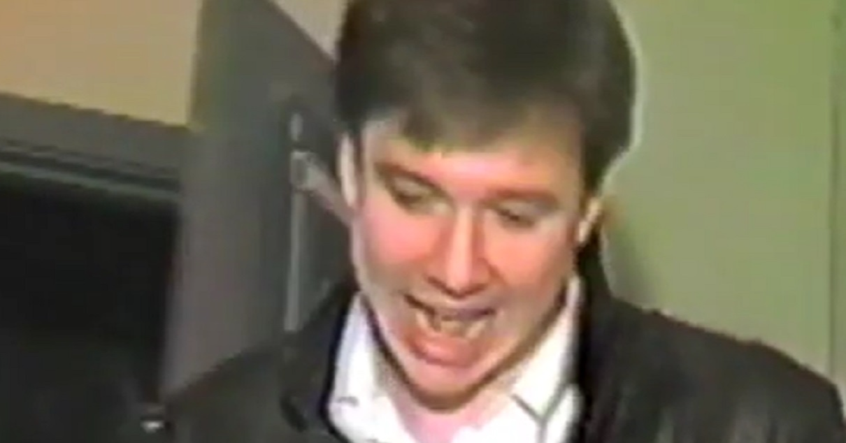 Screenshot: Bill Hicks is smiling at hotel room - from American- The Bill Hicks Story (2009)