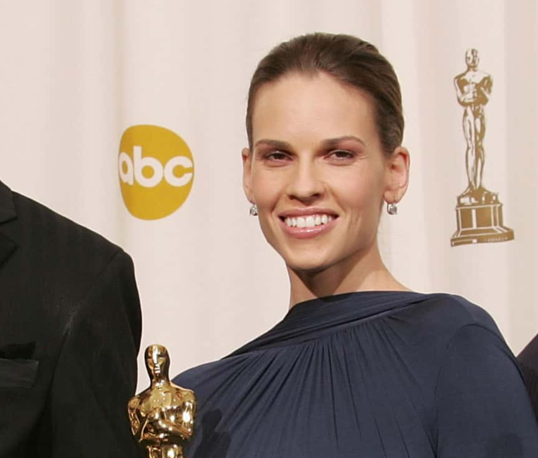 Best supporting actress Cate Blanchett, best supporting actor Morgan Freeman, best actress Hilary Swank and best actor Jamie Foxx pose backstage with their Oscar