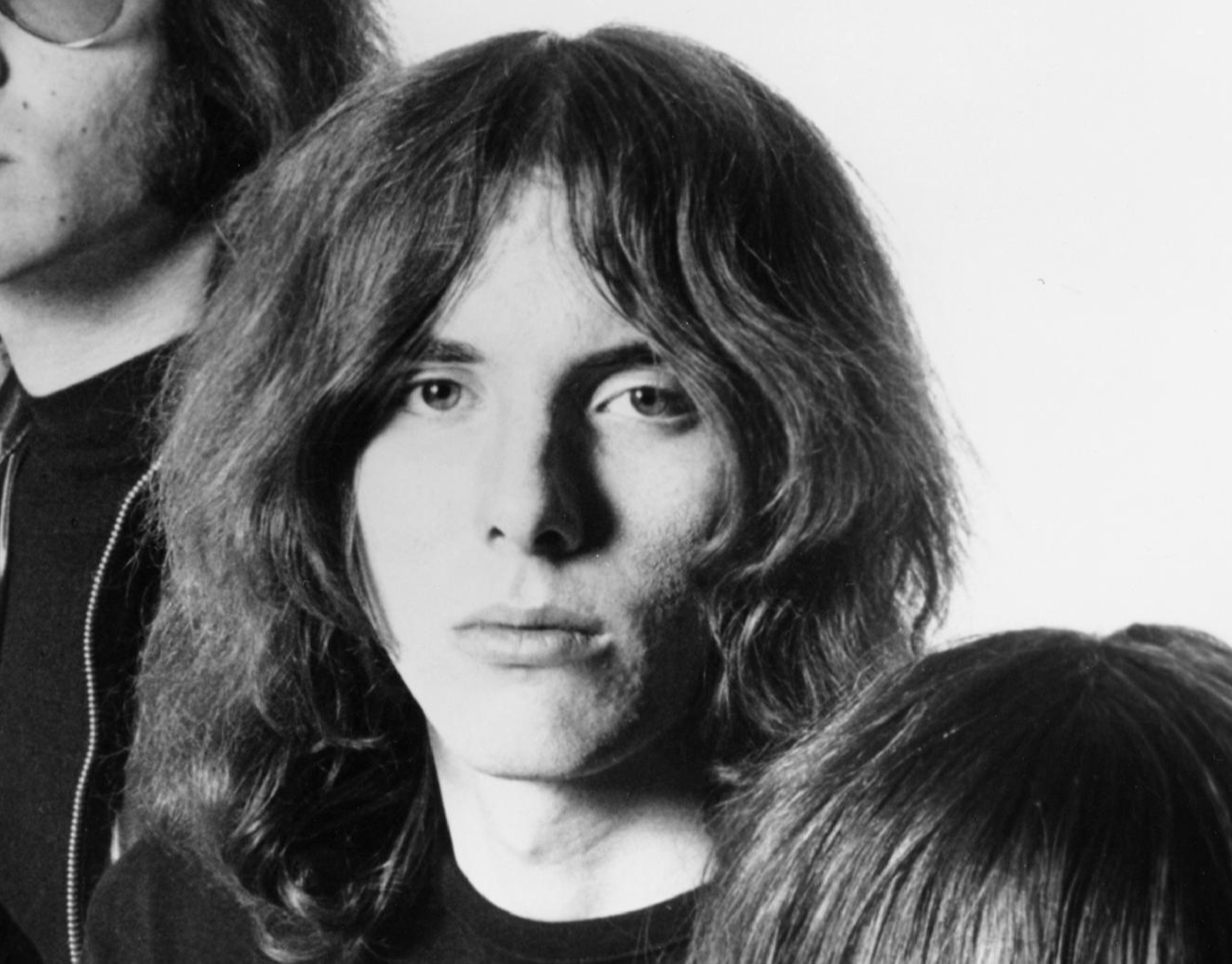 A promotional portrait of The Stooges