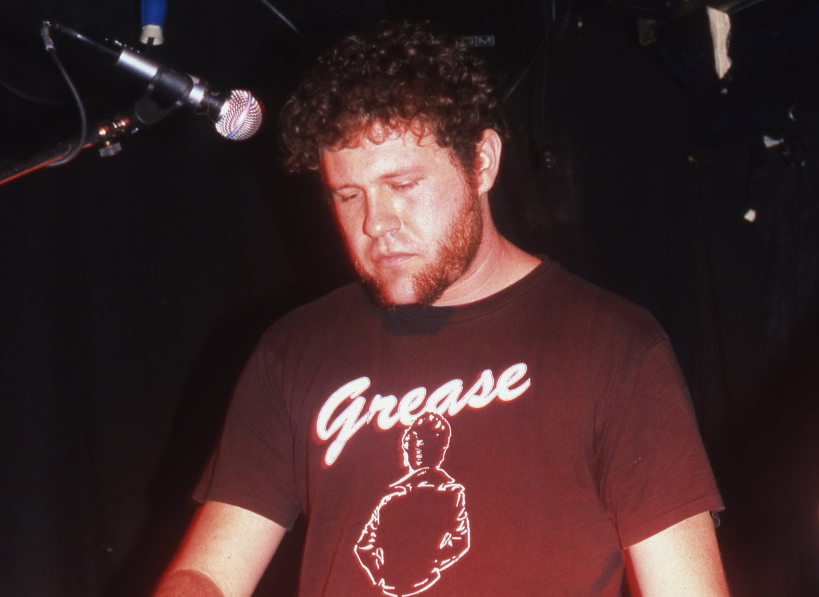 Jeremy Ward performs on stage with Mars Volta, London, United Kingdom, 2001.