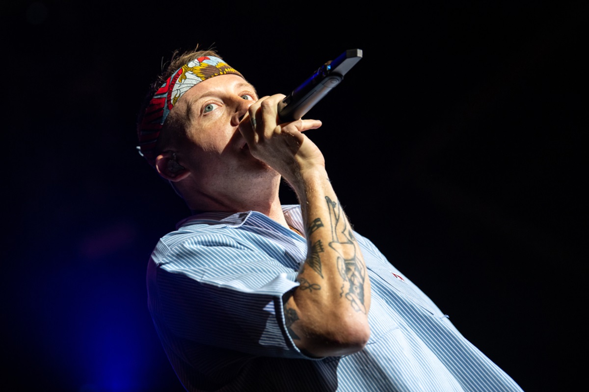 American rapper, songwriter, singer Macklemore sings on a stage with his band at the Lucca Summer Festival in Lucca, Italy - 2019
