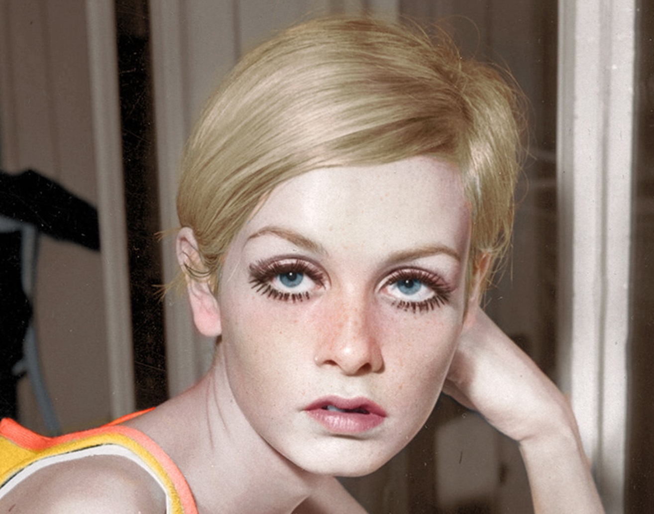 Twiggy looking at camera.