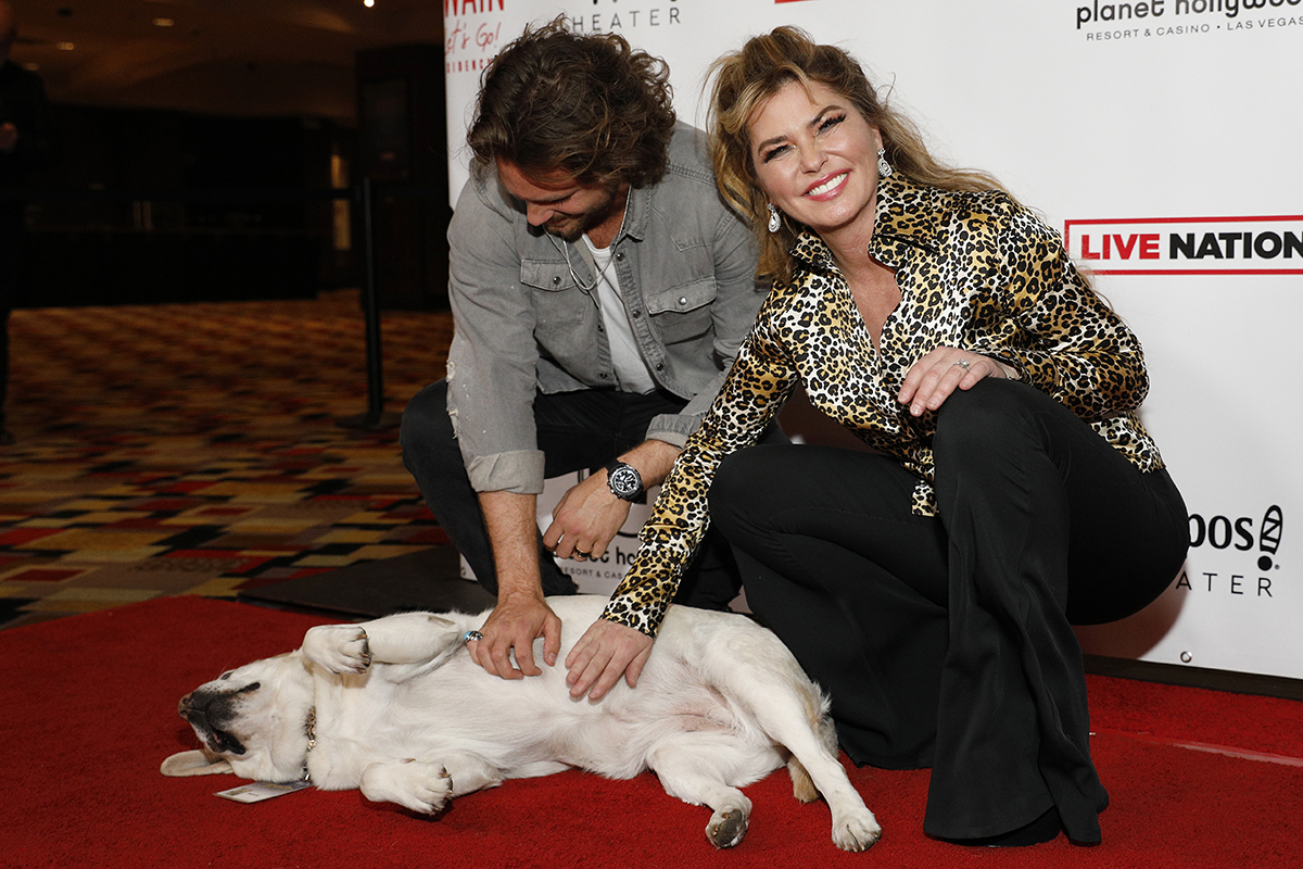Singer Bastian Baker, Shania Twain and dog Melody pose on the red carpet