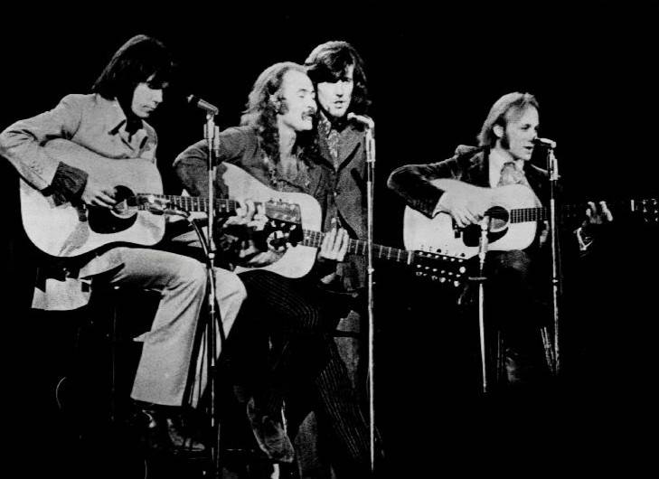Crosby, Stills, Nash & Young performing on stage in 1970