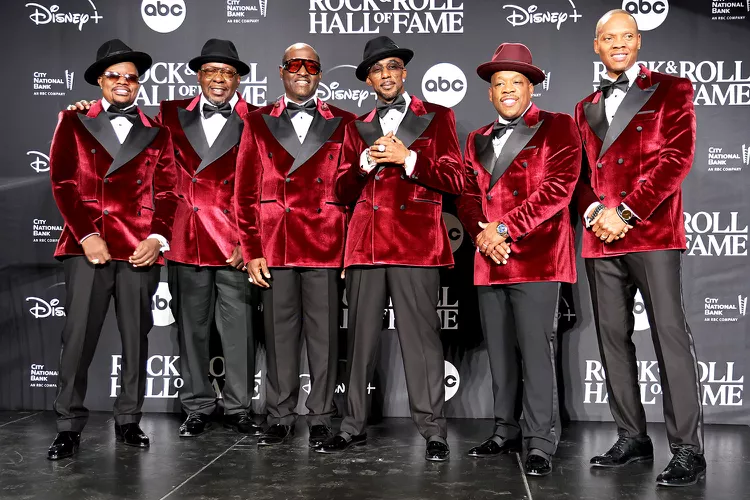 Portrait Photo of the Members of New Edition on stage.