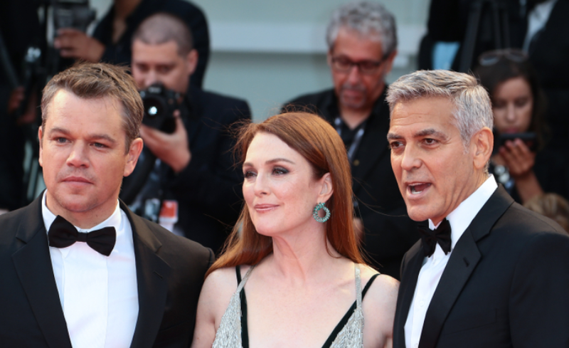 Julianne Moore, Matt Damon and George Clooney at the red carpet