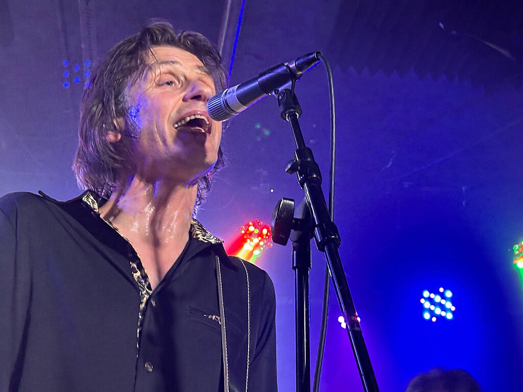 Mike Edwards of Jesus Jones performs in Asbury Park, NJ