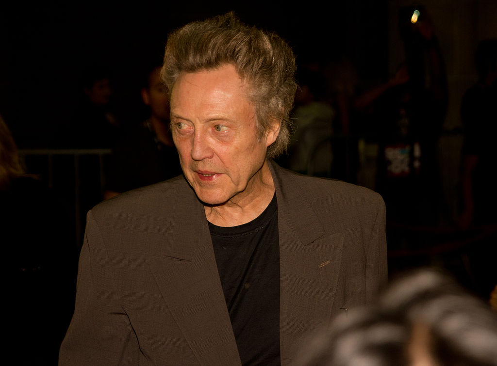 Christopher Walken wearing brown jacket