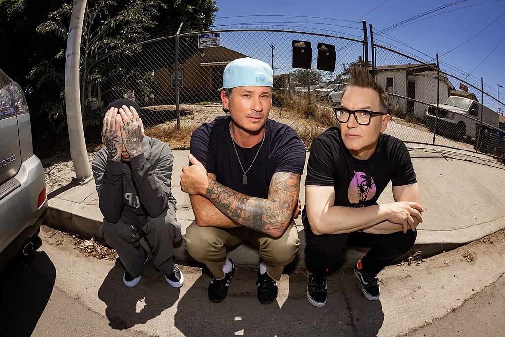 Members of the American rock band Blink-182 pose together
