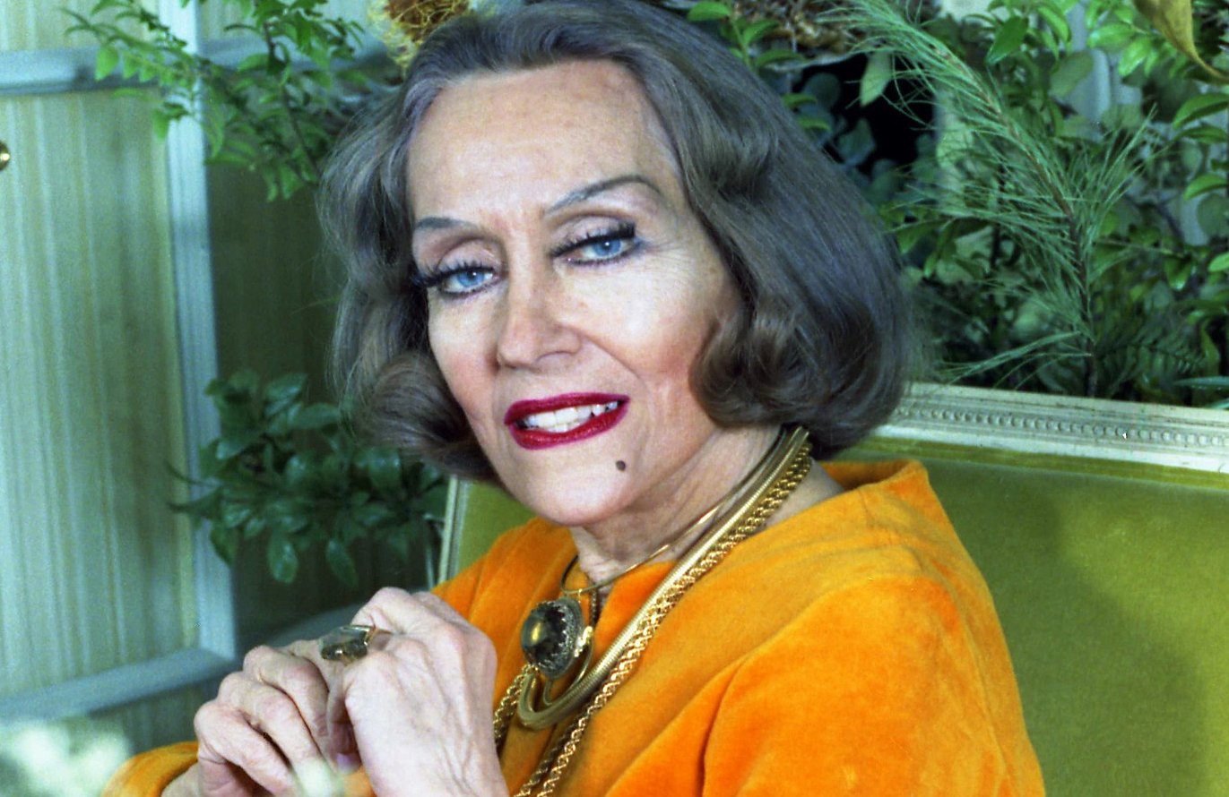 Gloria Swanson with massive jewelry