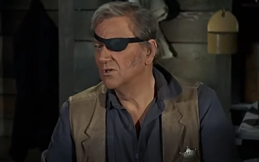 John Wayne as Rooster Cogburn